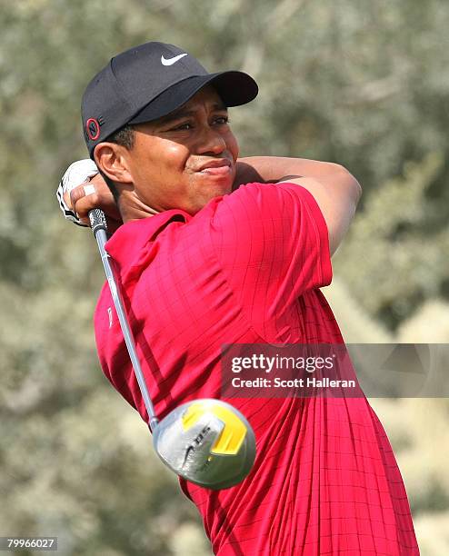 Tiger Woods hits his tee shot on the 18th hole during the Championship match of the WGC-Accenture Match Play Championship at The Gallery at Dove...
