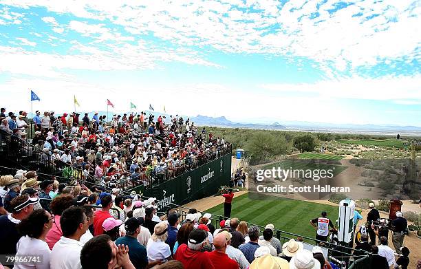 Tiger Woods hits his tee shot on the 19th hole during the Championship match of the WGC-Accenture Match Play Championship at The Gallery at Dove...
