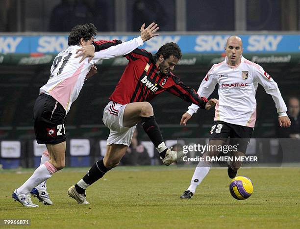 Milan's forward Alberto Gilardino fights for the ball with Palermo's defender Giuseppe Biava and Palermo's Australian midfielder Marck Bresciano ,...