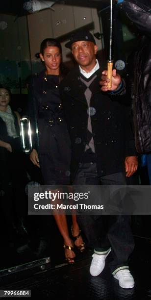 Entrepreneur Russell Simmons and galpal model Porschia Coleman sighting leaving Mr Chow's resturant in Beverly Hills on February 21 2008 in Los...