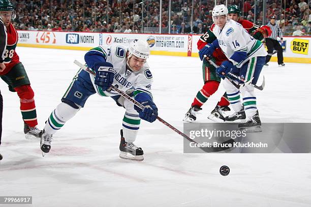 Byron Ritchie of the Vancouver Canucks shoots the puck against the Minnesota Wild during the game at Xcel Energy Center on February 19, 2008 in Saint...