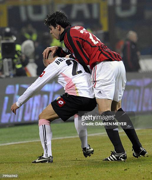 Milan's Brazilian midfielder Kaka fights for the ball with Palermo's Australian midfielder Marck Bresciano during the Italian Serie A football match...