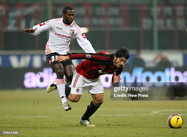 Gennaro Gattuso of Milan and Fabio Simplicio of Palermo in action during the Serie A match between Milan and Palermo at the Stadio San Siro on...