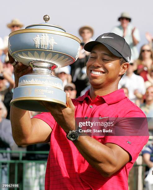 Tiger Woods holds the Walter Hagen Cup after winning the Championship match of the WGC-Accenture Match Play Championship at The Gallery at Dove...