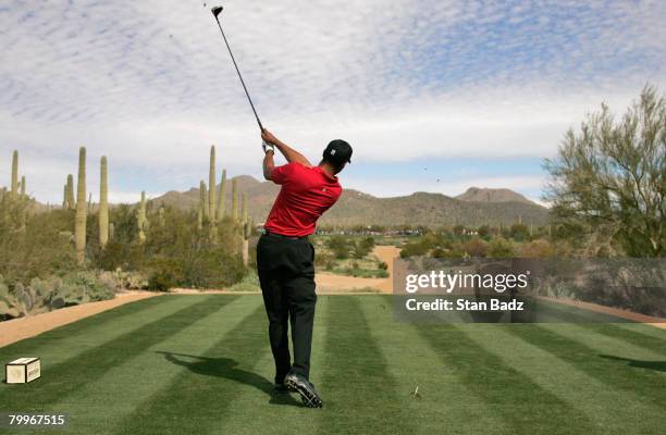 Tiger Woods hits from the 9th tee during the Championship match of the WGC-Accenture Match Play Championship at The Gallery at Dove Mountain on...