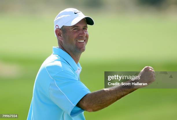Stewart Cink reacts to an eagle putt on the 28th green during the Championship match of the WGC-Accenture Match Play Championship at The Gallery at...