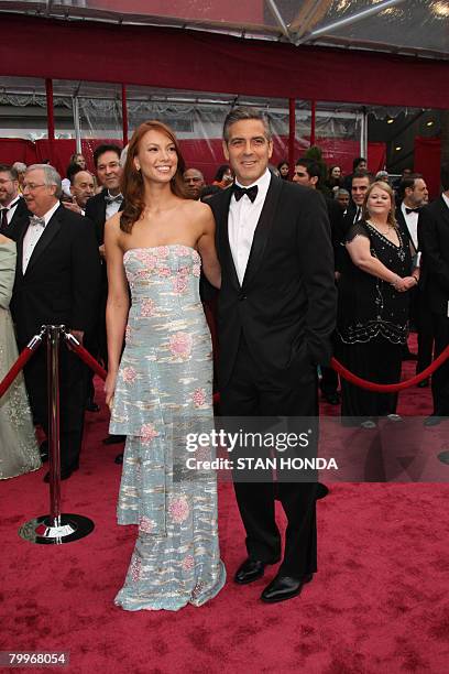 Nominee for Best Actor George Clooney and gilrfriend Sarah Larson arrive for the 80th Annual Academy Awards at the Kodak Theater in Hollywood,...