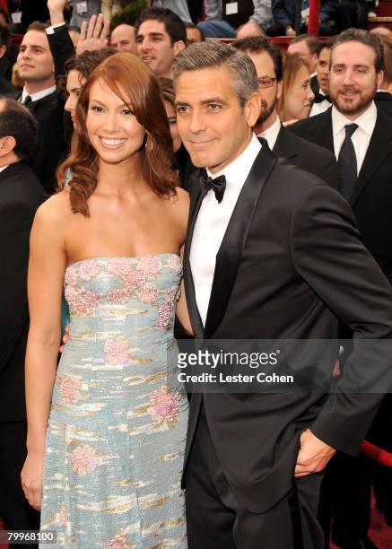 Actor George Clooney and Sarah Larson attends the 80th Annual Academy Awards at the Kodak Theatre on February 24, 2008 in Los Angeles, California.