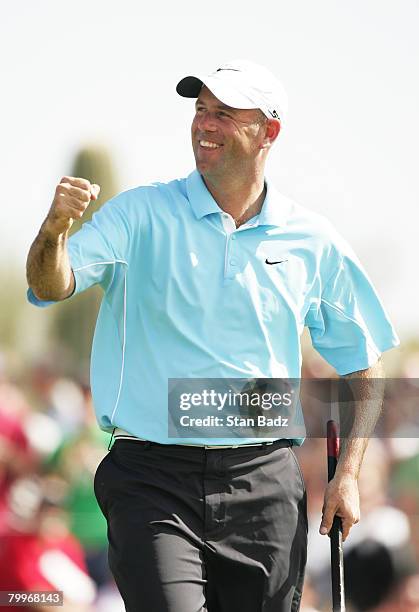 Stewart Cink reacts to his eagle putt on the 10th green during the Championship match of the WGC-Accenture Match Play Championship at The Gallery at...