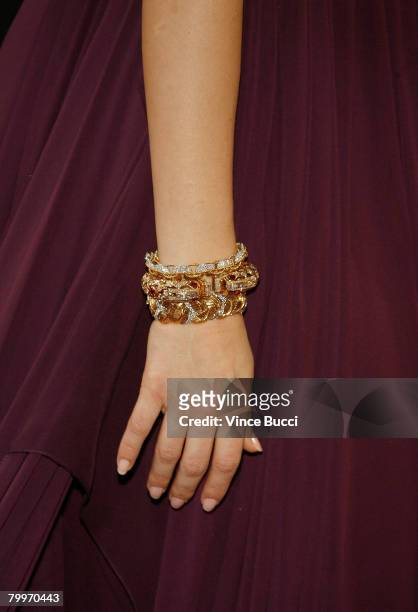 Detailed view of actress Jessica Alba jewelry and handbag are seen as she arrives at the 80th Annual Academy Awards held at the Kodak Theatre on...