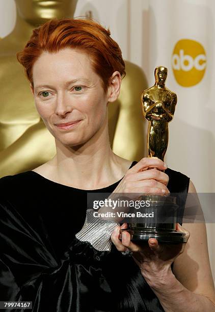 Actress Tilda Swinton, winner of the Performance By An Actress In A Supporting Role award for "Michael Clayton" poses in the press room during the...