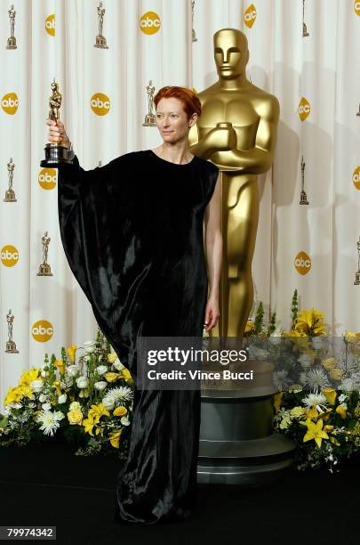 Actress Tilda Swinton, winner of the Performance By An Actress In A Supporting Role award for "Michael Clayton" poses in the press room during the...