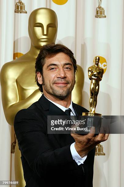 Actor Javier Bardem, winner of the Performance By An Actor In A Supporting Role award for "No Country for Old Men" poses in the press room during the...