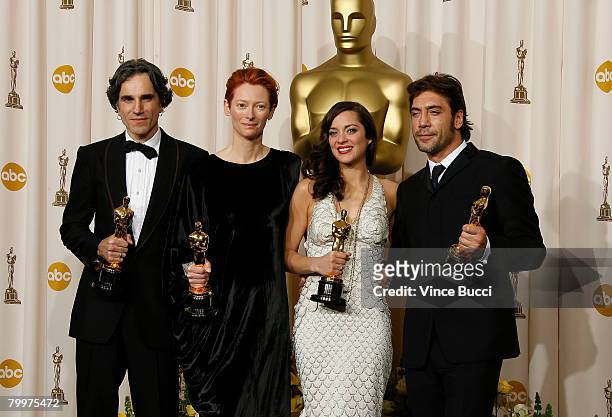 Actor Daniel Day-Lewis, actress Tilda Swinton, actress Marion Cotillard and actor Javier Bardem pose in the press room during the 80th Annual Academy...
