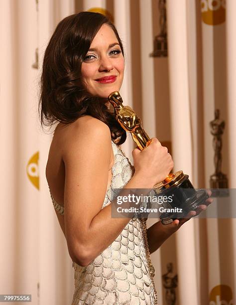 Actress Marion Cotillard poses in the press room during the 80th Annual Academy Awards at the Kodak Theatre on February 24, 2008 in Los Angeles,...