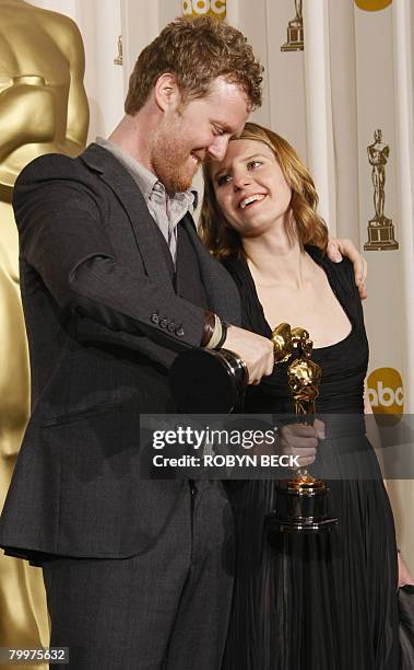Winner for Best Original Song Glen Hansard and Marketa Irglova pose with the trophy during the 80th Annual Academy Awards at the Kodak Theater in...