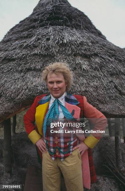 English actor Colin Baker pictured in character as The Doctor on location during filming of the BBC television science fiction series Doctor Who in...