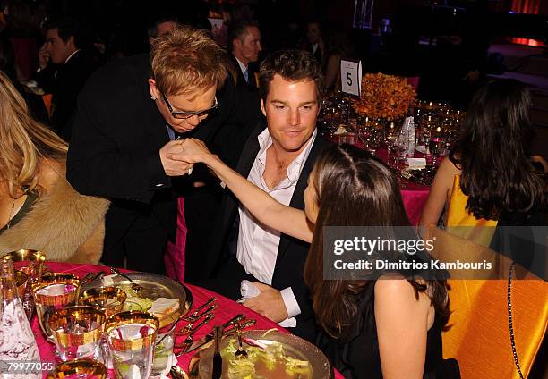 Elton John greets actor Chris O'Donnell and Caroline Fentress at the 16th Annual Elton John AIDS Foundation Academy Awards viewing party at the...