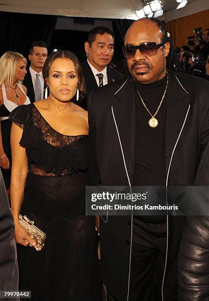 Musician Stevie Wonder and his wife, designer Kai Milla Morris attend the 16th Annual Elton John AIDS Foundation Oscar Party at the Pacific Design...