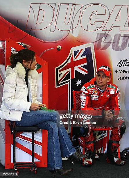 Casey Stoner and his wife Adriana sit in the Ducati Team garage during MotoGP Testing at the Circuito de Jerez, on February 18, 2008 in Jerez, Spain.