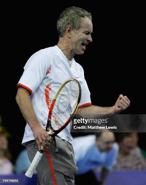 John McEnroe of the United States celebrates a point against Bjorn Borg of Sweden during the second day of the BlackRock Tour of Champions at the...