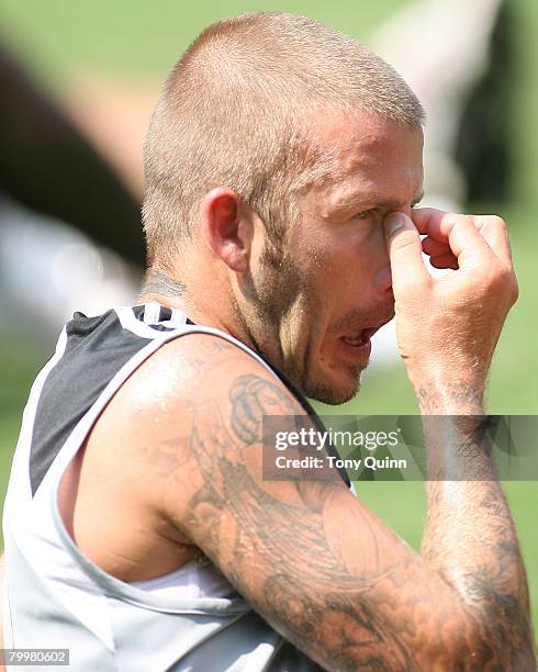 David Beckham rests during a light training session at RFK stadium on August 8, 2007 in Washington, DC. David Beckham held a news conference and...