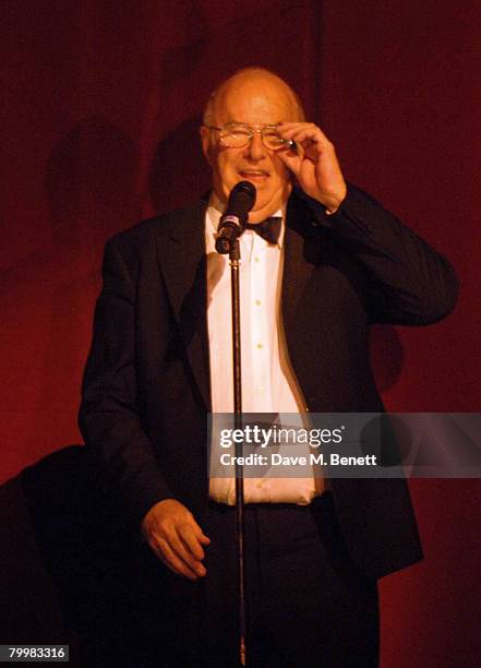 Clive James speaks at the 'I'd Like To Teach The World To Sing' Gala Tribute Concert to voice coach Ian Adam, at the Her Majesty's theatre in...