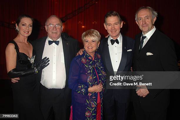 Lorraine Chase, Clive James, Gloria Hunniford, Anthony Andrews and Jonathan Pryce attend the 'I'd Like To Teach The World To Sing' Gala Tribute...