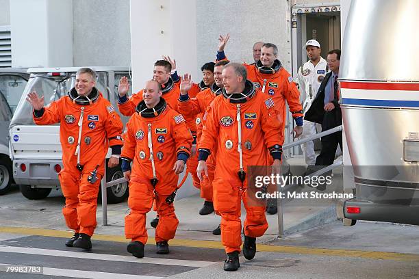 Space Shuttle Endeavour pilot Gregory H. Johnson , mission specialists Garrett Reisman, Robert L. Behnken, Japanese astronaut Takao Doi, Mike...