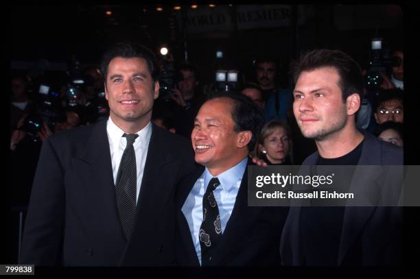 John Travolta, John Woo and Christian Slater attend the premiere of "Broken Arrow" February 5, 1996 in Los Angeles, CA. Woo directed Travolta and...