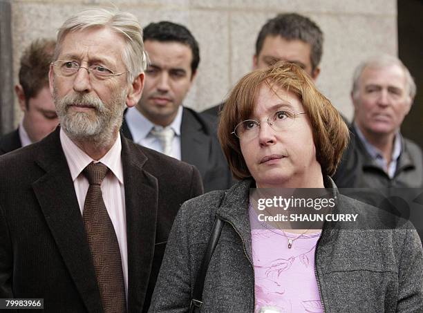 Dominique and Jean-Francois Delagrange, the parents of murdered French student Amelie Delagrange, give a statement to the media outside Central...