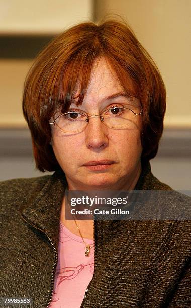 The mother of Amelie Delagrange, Dominique listens during a press conference at Snow Hill Police Station on February 25, 2008 in London, England....