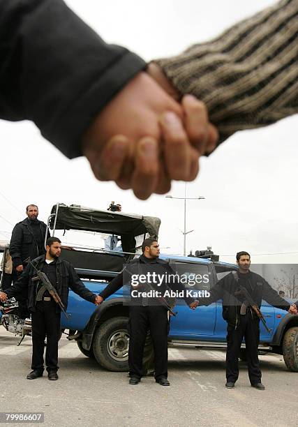 Palestinian police close the main road to prevent Palestinian protesters reaching Israel as protestors attend a human chain protest starting at the...