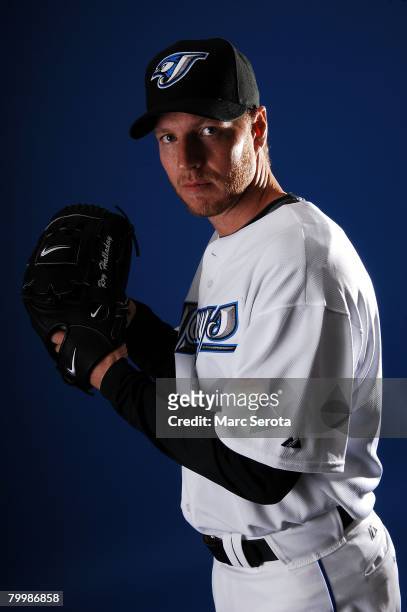 Pitcher Roy Halladay of the Toronto Blue Jays poses for photos on media day at the Bobboy Mattix Training Center during spring training February 22,...
