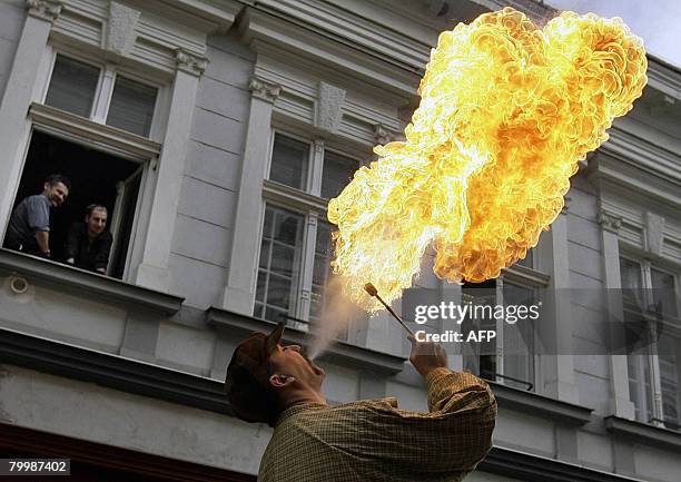 Hungary-lifestyle-festival-gastronomy-offbeat A participant of the 8th Jelly Festival, a fire-eater showman presents his production in Miskolc, about...