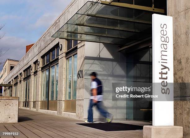 Man walks out of Getty Images corporate headquarters February 25, 2008 in Seattle, Washington. The company announced it had been acquired by private...