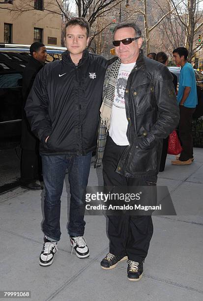 Actor Robin Williams with his son Zach outside their hotel February 25, 2008 in New York City.