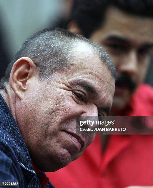 Venezuelan Minister of Interior and Justice Ramon Rodriguez Chacin gestures during a press conference next to Venezuelan Minister of Foreign Affairs...