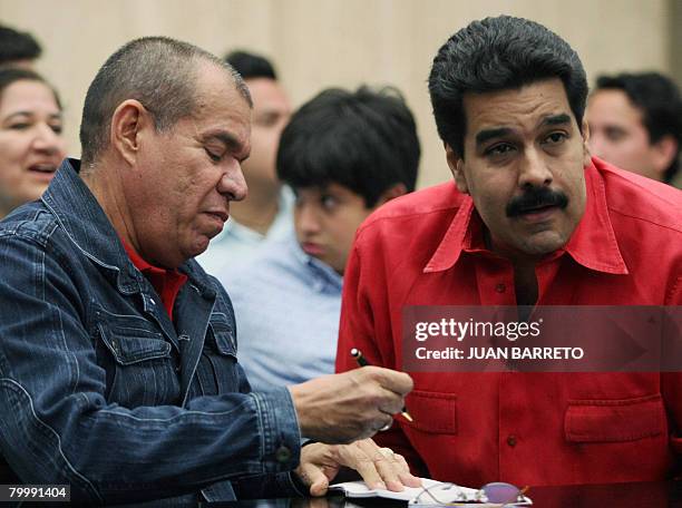 Venezuelan Minister of Interior and Justice Ramon Rodriguez Chacin and Venezuelan Minister of Foreign Affairs Nicolas Maduro delivger a press...