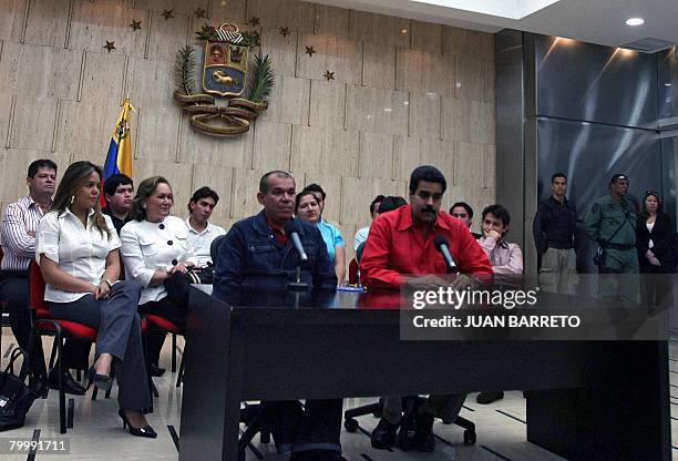 Venezuelan Minister of Interior and Justice Ramon Rodriguez Chacin and Venezuelan Minister of Foreign Affairs Nicolas Maduro deliver a press...