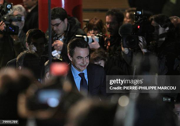 Spanish Prime Minister Jose Luis Rodriguez Zapatero leaves a television debate with Popular Party leader Mariano Rajoy in Madrid on February 25,...