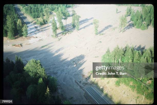 Mudslide covers a road May 23, 1980 in Washington State. On May 18 an earthquake caused a landslide on Mount St. Helens'' north face, taking off the...
