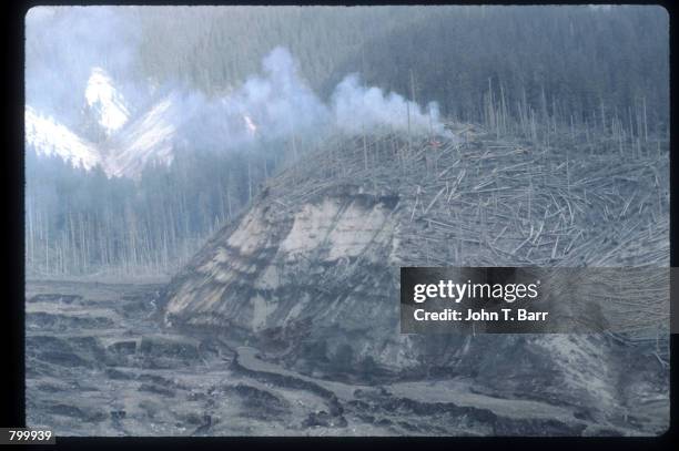 Fire burns May 23, 1980 in Washington State. On May 18 an earthquake caused a landslide on Mount St. Helens'' north face, taking off the top of the...