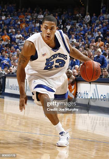 Derrick Rose of the Memphis Tigers drives the baseline against the Tennessee Volunteers at FedExForum on February 23, 2008 in Memphis, Tennessee....