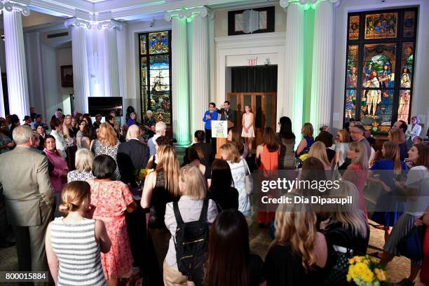 Women's Sports Foundation founder Billie Jean King, Brett Goodman, and Kellen Richbourg speak onstage during the Women's Sports Foundation 45th...