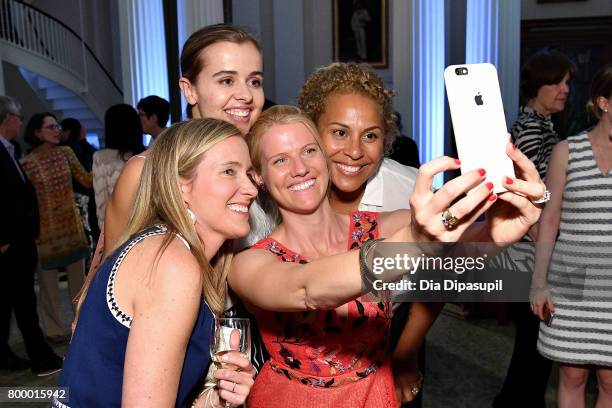 Kelly Christina Nascimento-DeLuca and guests take a selfie during the Women's Sports Foundation 45th Anniversary of Title IX celebration at the...