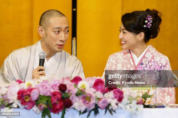 File photo taken in January 2010 shows Japanese kabuki star Ichikawa Ebizo and TV personality Mao Kobayashi attending a press conference to announce...