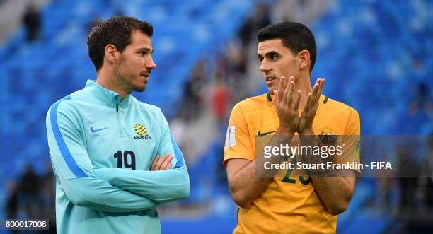 Ryan McGowan and Tomas Rogic of Autralia look on after the FIFA Confederation Cup Group B match between Cameroon and Australia at Saint Petersburg...