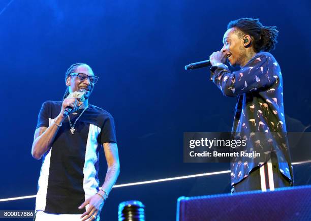 Recording artists Snoop Dogg and Wiz Khalifa perform onstage at night one of the 2017 BET Experience STAPLES Center Concert, sponsored by Hulu, at...