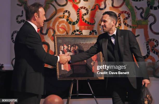 Kevin Spacey and Dynamo attend the Woodside Gallery Dinner in benefit of Elton John AIDS Foundation in partnership with BVLGARI at Woodside on June...